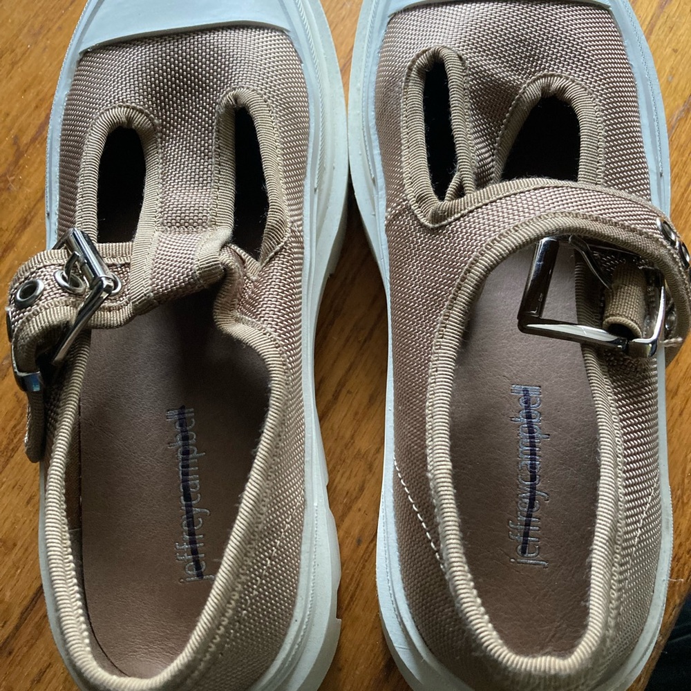 EUC Jeffrey Campbell tan platforms.